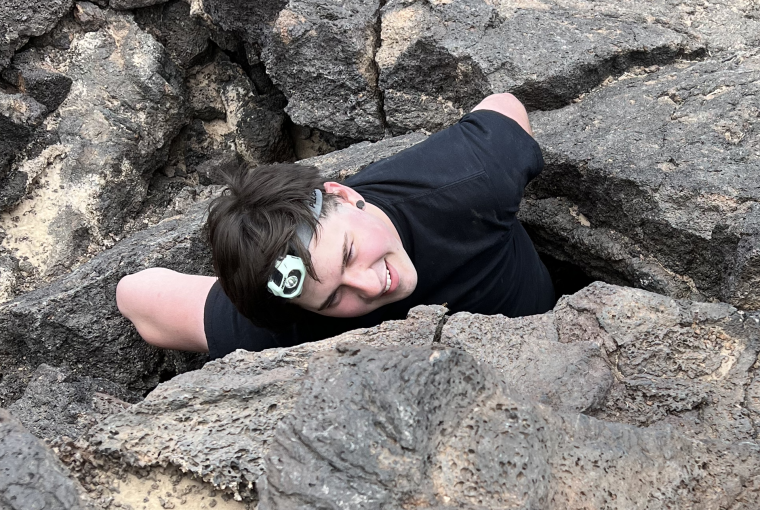 a photo of reed emerging from a lava tube